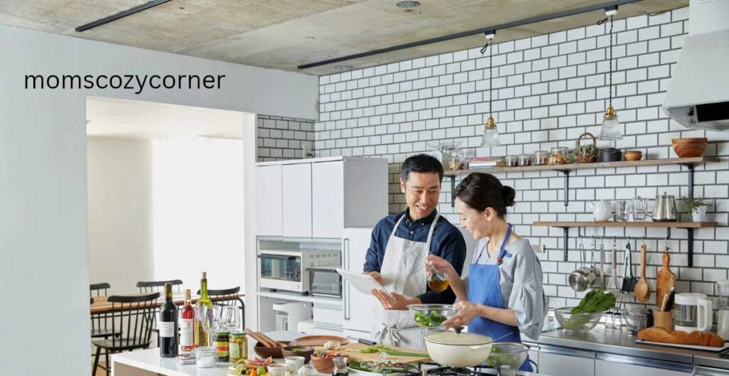 Couple cooking dinner and laughing together, showing how to control emotions in a relationship through teamwork and resilience.