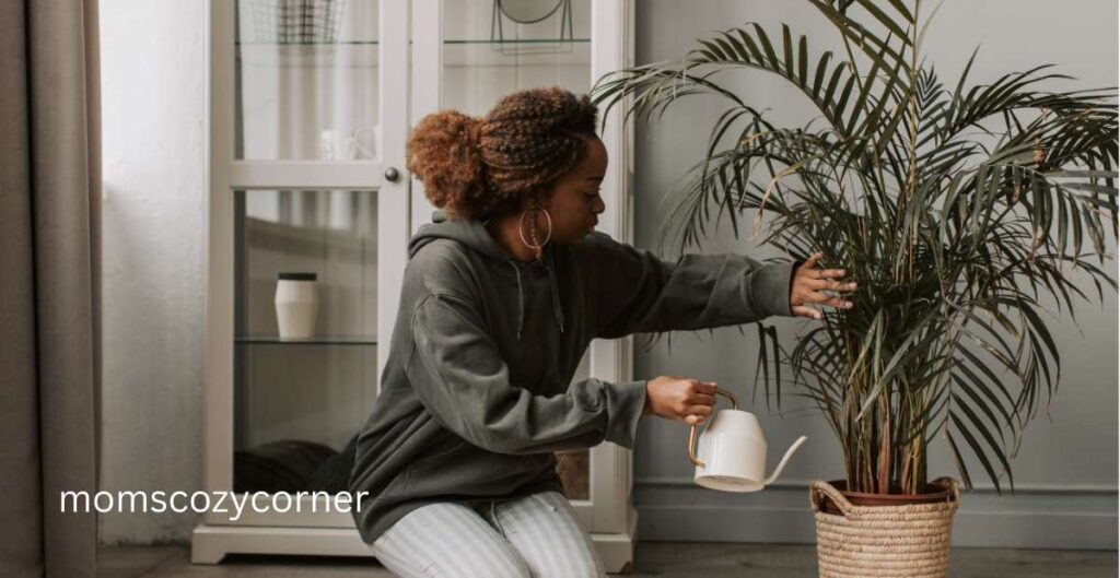 Mom watering plants as a grounding technique to reduce intrusive thoughts using the 15-minute rule.