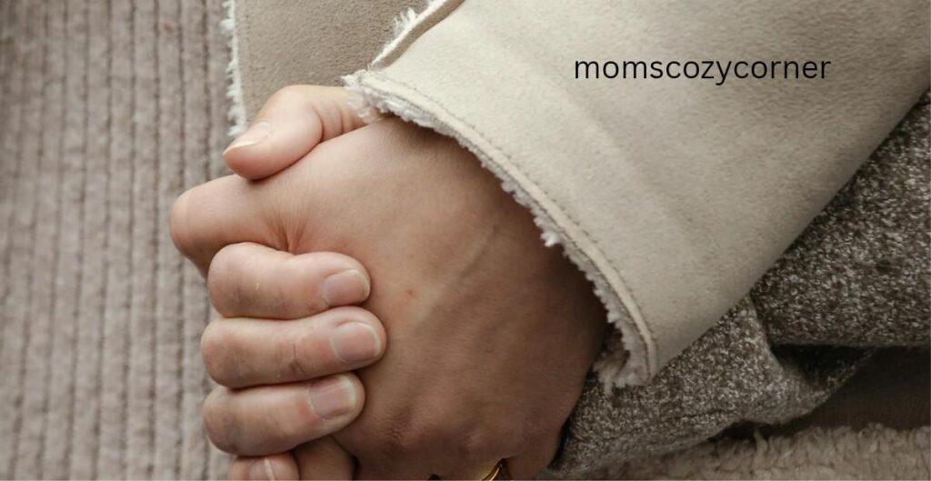 Close-up of a parent holding a child’s hand, symbolizing safety and emotional connection in gentle parenting.